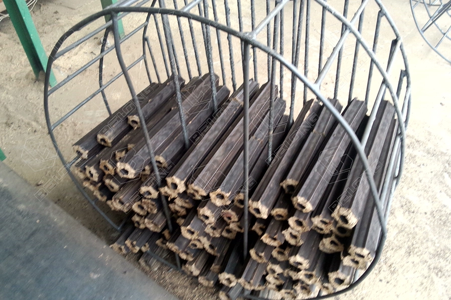 hexagonal sawdust briquettes in steel basket